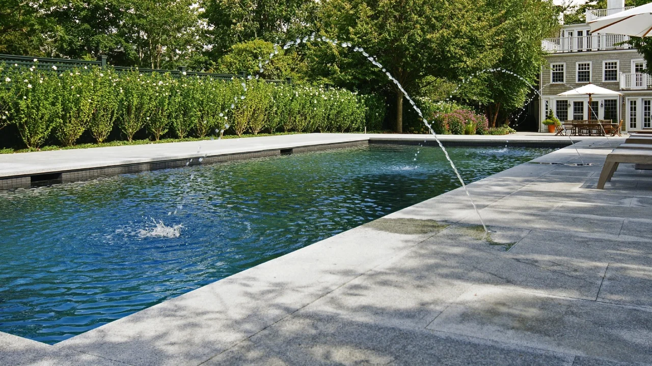 Wonderful Landscaping Through Indiana Limestone Pavers and Pool Coping for Your Stately Home
