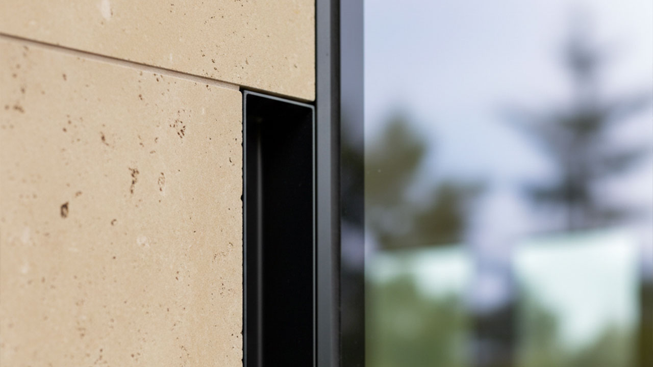 Material Harmony: Blending Limestone with Glass and Metal in Modern Facades